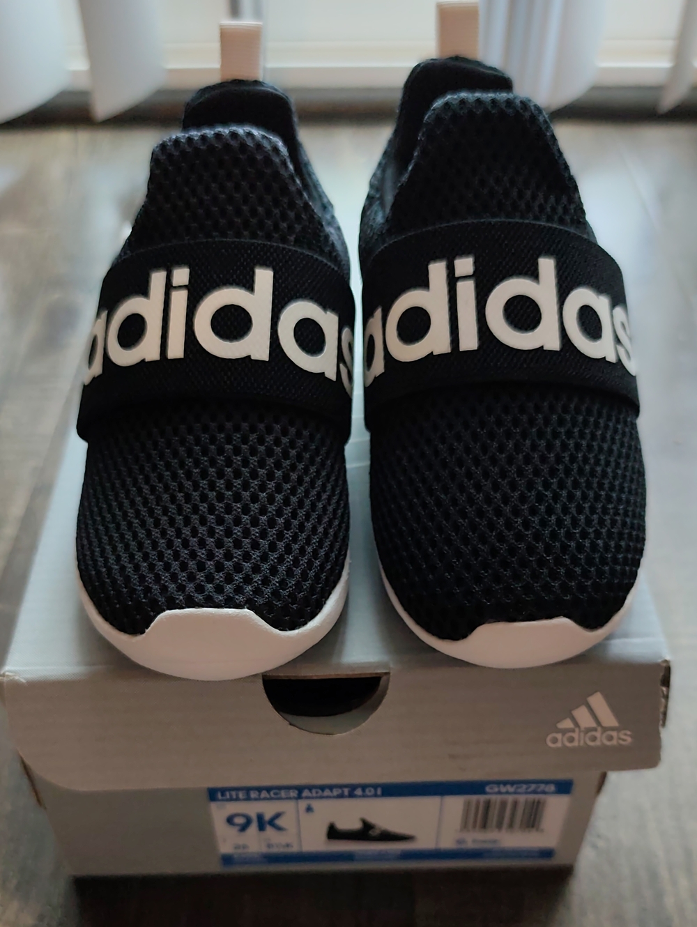 Adidas Kids Black and White Slip-On Mesh Sneakers